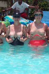 Four pairs of boobs in the pool