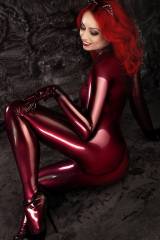 Goth in latex. Wow, so smooth looking!