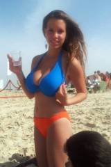 Busty beach brunette
