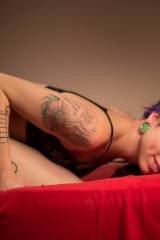 Tattooed chick with purple hair... [x-post /r/redl...