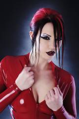 Great pic of an intriguing girl with red & black h...
