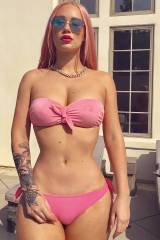 Iggy Azalea in a pink bikini