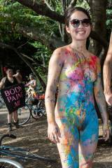 Cute body painted Asian happy to be naked in publi...